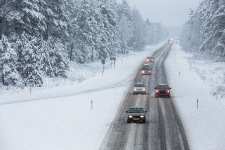 cars driving in snow